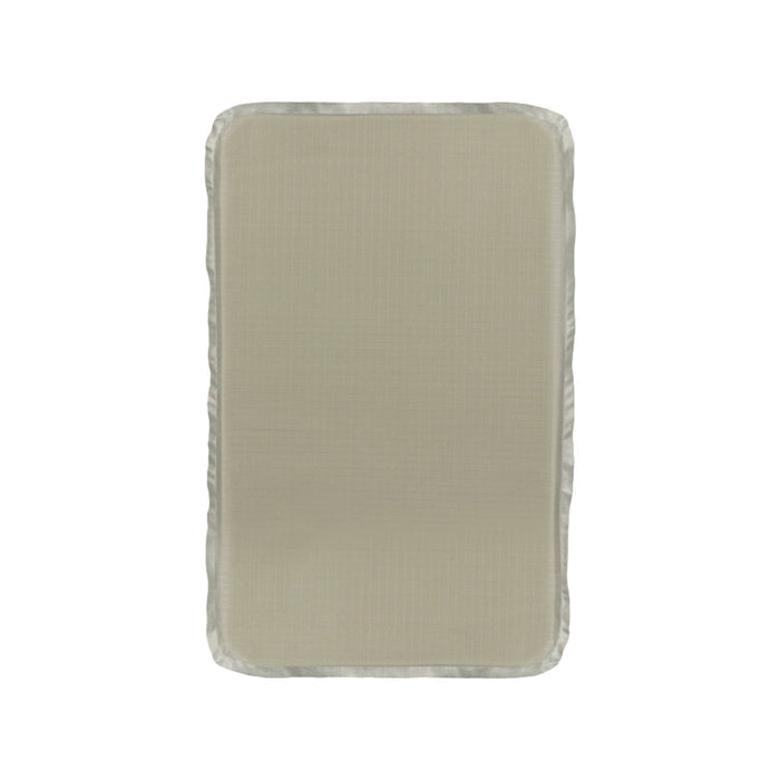 Rectangular beige changing pad with rounded corners and a raised edge, shown on a white background—offers everyday comfort for your baby, similar to the Premier Body Armor Everyday Armor T-shirt 360 Core.