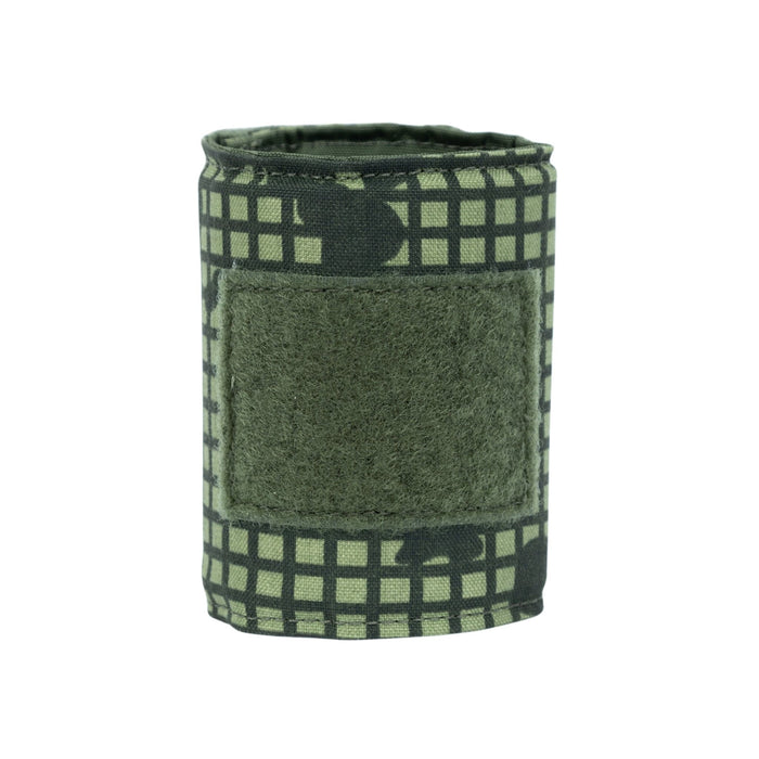 The Premier Body Armor Bulletproof Can Cooler - Limited Edition 2026 features a green and black Desert Night Camo grid with a prominent green patch, shown upright on white. Perfect for SHOT Show 2026.