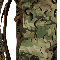 A close-up of the OPE Gear Backpack Scrim - Camouflage Pack Cover by OPE Gear, highlighting its camouflage pattern, Cordura nylon construction, laser-cut slits, mesh padding, and detailed stitching.