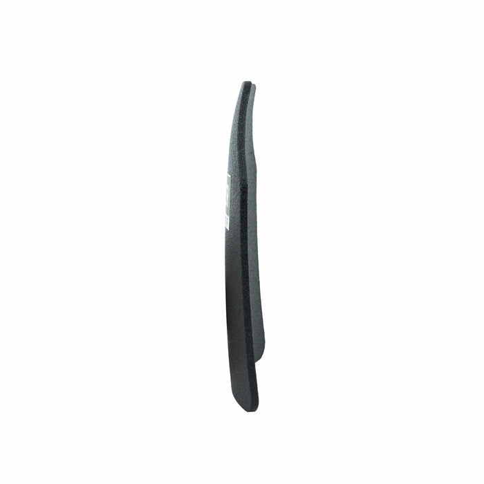 The Agile IIIA Speed Plate from Premier Body Armor, a black foam insole designed with the sleek profile of a lightweight body armor insert, is depicted standing on its edge against a white background—side view highlighting its thickness and contour.