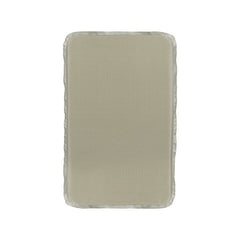 Rectangular beige changing pad with rounded corners and a raised edge, shown on a white background—offers everyday comfort for your baby, similar to the Premier Body Armor Everyday Armor T-shirt 360 Core.