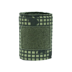The Premier Body Armor Bulletproof Can Cooler - Limited Edition 2026 features a green and black Desert Night Camo grid with a prominent green patch, shown upright on white. Perfect for SHOT Show 2026.