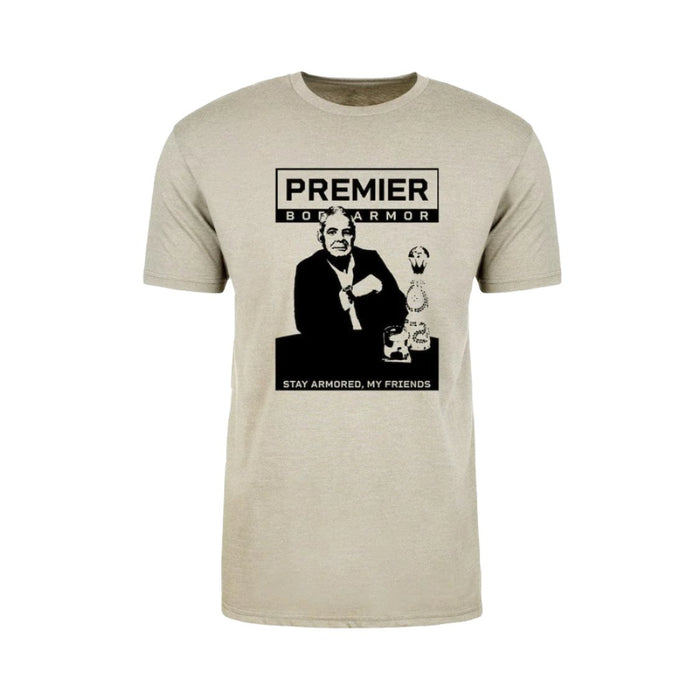 The Limited Edition 10th Anniversary T-Shirt by Premier Body Armor is a beige short-sleeve shirt featuring a black and white graphic of a man in a suit holding a glass, with the text "PREMIER BODY ARMOR" above and "STAY ARMORED, MY FRIENDS" below. This minimalist design commemorates the brand's 10th anniversary.