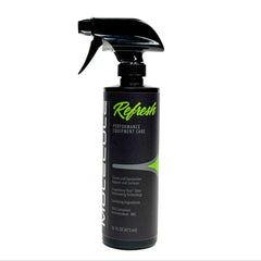 A 16 oz (473 mL) black spray bottle of Molecule Refresh Sprayer, featuring green and white text on the label, is upright against a white background. Designed for cleaning and deodorizing equipment and surfaces, this product serves as an effective gear odor eliminator and deodorizer for technical fabrics.