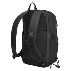 The Vertx Any Day Backpack by Vertx is a black EDC pack with padded shoulder straps, a top carry handle, zippered compartments, a small geometric logo on the left strap, and a ballistic-panel compatible design. Shown photographed on a white background.